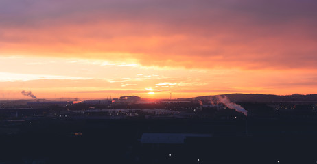 A beautiful orange and purple sunrise over Sheffields industrial area