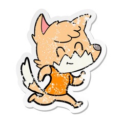 distressed sticker of a cartoon happy fox
