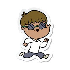 Obraz premium sticker of a cartoon boy wearing sunglasses and running