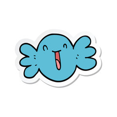 sticker of a cartoon happy candy