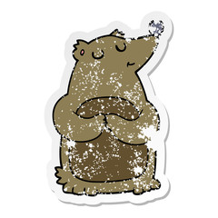 distressed sticker of a cartoon bear