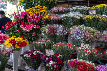 Fototapeta na wymiar Bouquet and bunch of flowers for sale