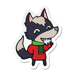 sticker of a cartoon hungry wolf in winter clothes