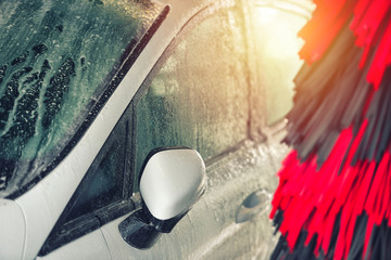 Automatic car wash in action. Car wash concept. Automated technology © Daniel CHETRONI