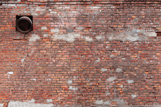 Old brick wall with scratches, cracks, dust, crevices, roughness. Can be used as a poster or background for design. © INTHEBLVCK