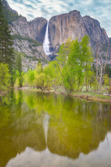 Fototapeta na wymiar Yosemite waterfalls reflected in Merced river, Yosemite National Park, California, USA