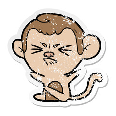 distressed sticker of a cartoon angry monkey