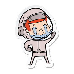 sticker of a cartoon crying astronaut