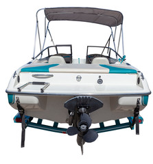 Isolated rear view of recreational motorboat.