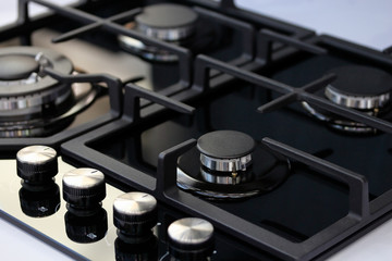 modern auto ignition gas stove with four burners