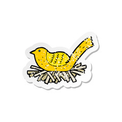 retro distressed sticker of a cartoon bird on nest