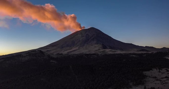 Aerial hyperlpase of the sunrise at the Popocatepetl active volcano in El Paso de Cortes. February 17,  2019.