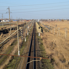 Plot railway. Top view on the rails. High-voltage power lines for electric trains
