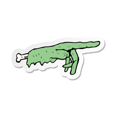 sticker of a cartoon pointing zombie hand
