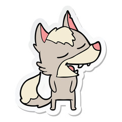 sticker of a cartoon wolf laughing