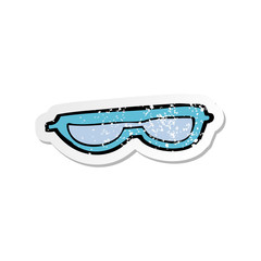 retro distressed sticker of a cartoon glasses