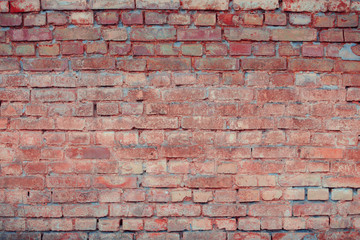 Old textured brick wall with natural defects. Scratches, cracks, crevices, chips, dust, roughness. Can be used as background for design or poster.