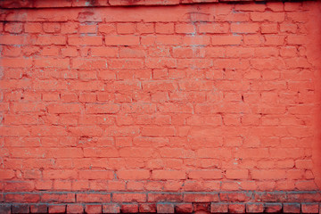 Fototapeta na wymiar Old textured brick wall with natural defects. Scratches, cracks, crevices, chips, dust, roughness. Can be used as background for design or poster.