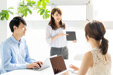 asian business group meeting in office