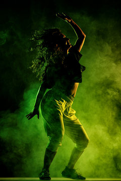 silhouette zumba dancer with smoke background
