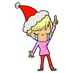 textured cartoon of a woman crying wearing santa hat