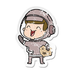 Obraz premium distressed sticker of a happy cartoon astronaut
