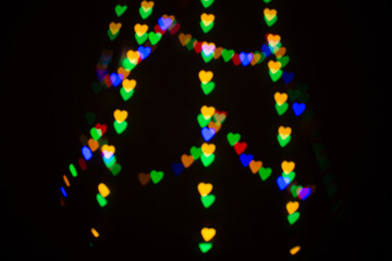 Colorful abstract heart shape blured bokeh at night