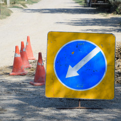 Sign of detour travel. Pit on the road. repair work.