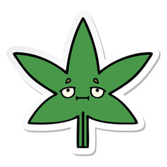 sticker of a cute cartoon marijuana leaf