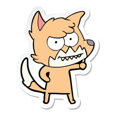 sticker of a cartoon grinning fox