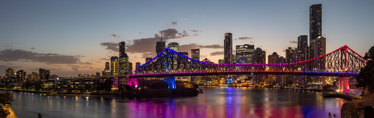 Fototapeta na wymiar Brisbane Australia February 2nd 2019 : Beautiful Story bridge illuminated in front of the CBD at dusk