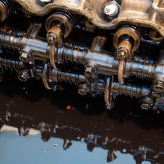 The head of the block of cylinders. The head of the block of cylinders removed from the engine for...