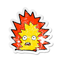 retro distressed sticker of a cartoon explosion