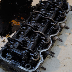 The head of the block of cylinders. The head of the block of cylinders removed from the engine for...