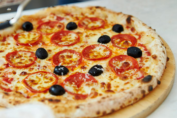 Pepperoni and olive pizza