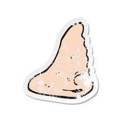 retro distressed sticker of a cartoon human nose