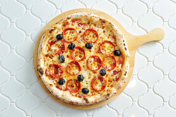 Pepperoni and olive pizza
