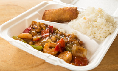 Leftover Kung Pao Shrimp in styrofoam takeout box.