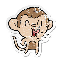 distressed sticker of a crazy cartoon monkey