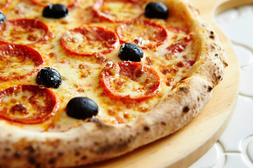 Pepperoni and olive pizza