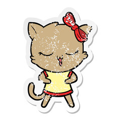 Obraz premium distressed sticker of a cartoon cat with bow on head