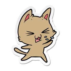 sticker of a cartoon cat hissing