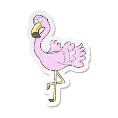 retro distressed sticker of a cartoon flamingo