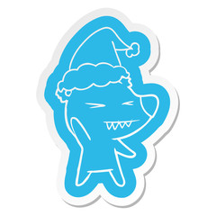 angry polar bear cartoon  sticker of a wearing santa hat