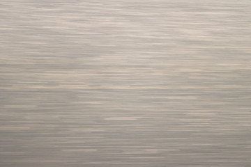Abstract white stripes on the gray surface, Blur motion background and texture