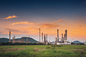 Fototapeta na wymiar Landscape of Oil and Gas Refinery Manufacturing Plant., Petrochemical or Chemical Distillation Process Buildings., Factory of Power and Energy Industrial at Twilight Sunset., Engineering Petroleum.