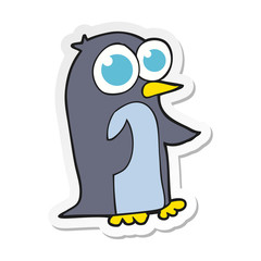 sticker of a cartoon penguin with big eyes