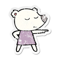 distressed sticker of a cartoon polar bear wearing dress