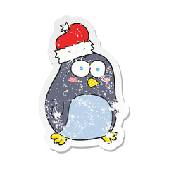 retro distressed sticker of a cartoon penguin