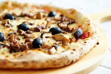 Grilled chicken, mushroom and olive pizza 